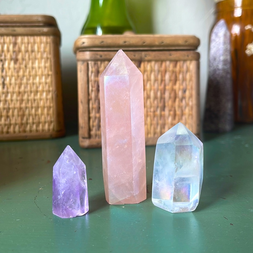 Angel aura quartz, rose aura quartz, and amethyst crystal tower points